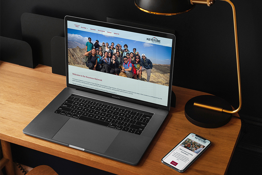 The Keystone Network website on laptop and mobile screens